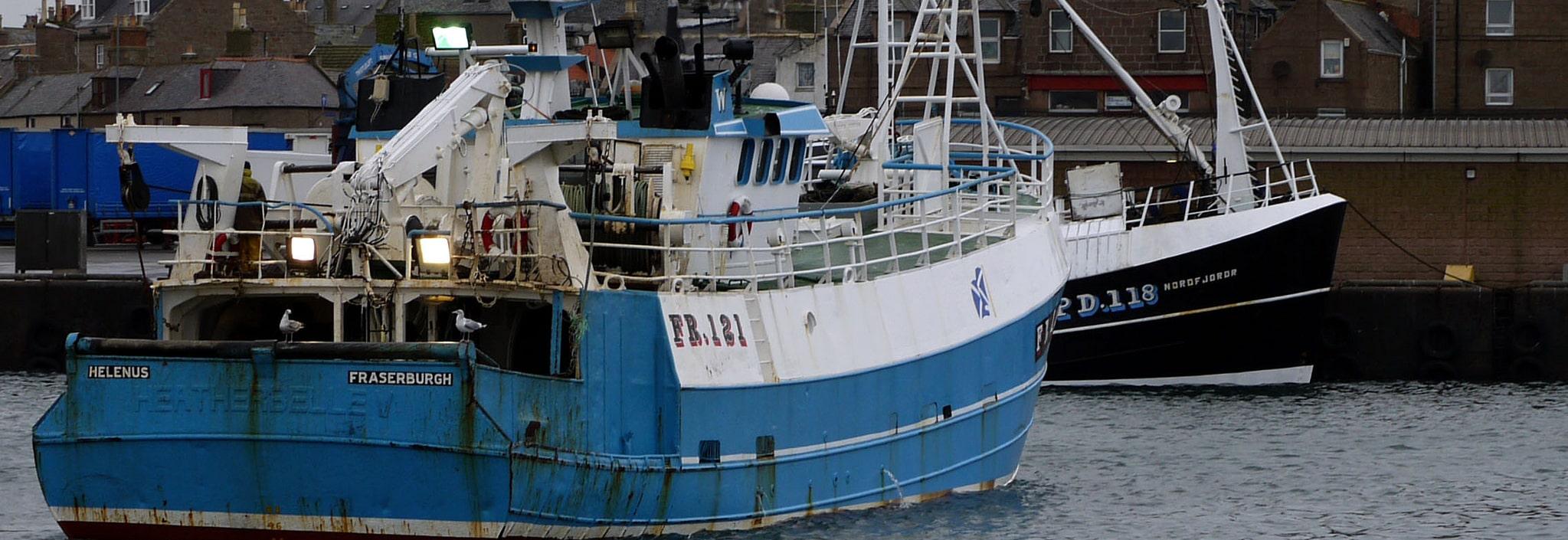 Fishing boat in harbour Scotland